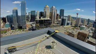 Post-construction rope access high-rise window cleaning with rigging