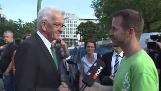 Diesel-Deal: Greenpeace-Aktivist stellt Grünen-Politiker Kretschmann zur Rede