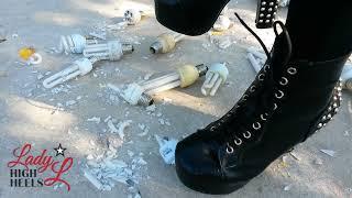 Crush High Heels Lady L crush light bulbs with black BDSM metal platform short muistress boots.