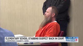 Elementary school stabbing suspect back in court