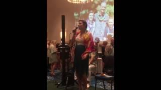 McKenzy singing 'The Climb' at the France's Foundation Gala