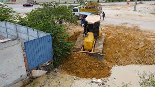 Incredible Operator KOMATSU DR51PX Bulldozer Spreading Soil , Dump Truck Pouring Soil In Pond Water