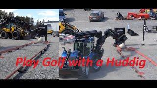 Play Golf with a Huddig Backhoe loader and Tiltrotator