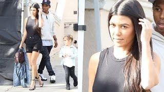 Kourtney Kardashian Flashes Her Legs At Rob's Birthday