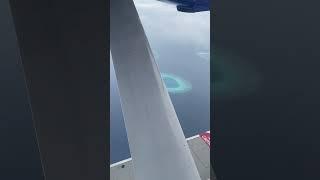 Flying over Atolls in the Maldives in a seaplane