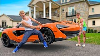 WORLDS STRONGEST MAN STOLE my McLaren SUPERCAR!!