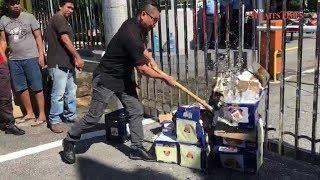 Jamal Yunos smashes crates of beer at SUK entrance, leaves others to clean up mess