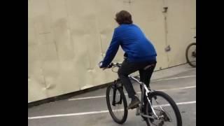 Dumb ass rides bike into wall