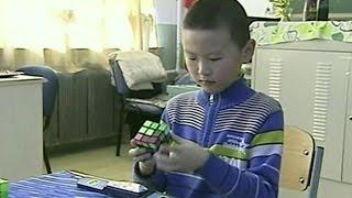 9 YEAR OLD BOY SOLVES RUBIK'S CUBE IN 11.84 SECONDS - BBC NEWS