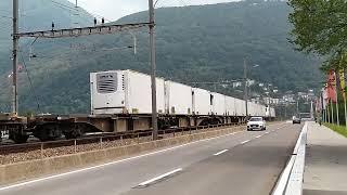 Re476.455 Railcare con merci da Stabio in transito a Melide (09/06/23)