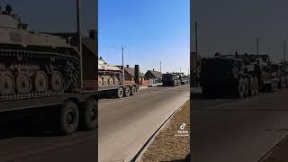 Western Belarus-Belarusian military equipment marked with red squares being transported in Slonim