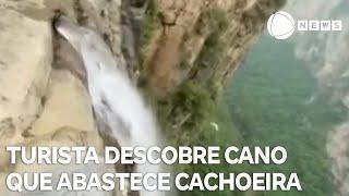 Turista descobre cano que abastece famosa cachoeira na China