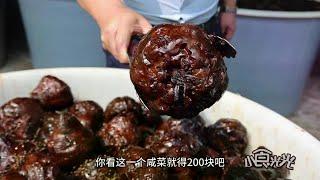 Shandong eldest brother sells pickles  all shaped like lion heads  pickled with soy sauce for 2 yea