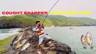 Fishing on baga beach in rocks A beautiful place to visit (Goa)