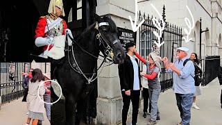 Was what this tourist couple did considered assault? The King's Guard on Duty at Horse Guards