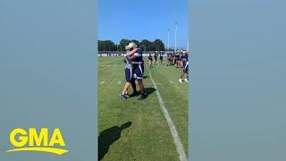 Watch the emotional moment Navy football player learns his sister won Olympic gold