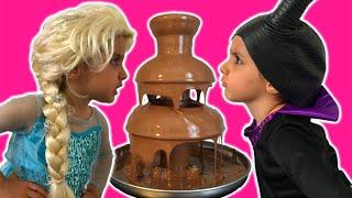 Elsa Vs Maleficent Real Life Disney Princess Movie + CHOCOLATE FOUNTAIN + Candy + 10 Surprise Eggs!