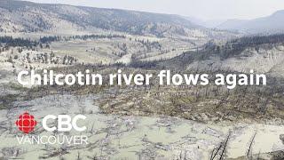 Water begins moving past landslide damming Chilcotin River