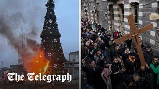 Christmas tree set on fire triggers protests in Syria