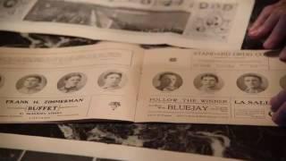 Lloyd Levin and his vintage Cubs memorabilia from 1907.