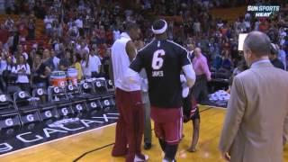 Dwyane Wade and Lebron James wheelbarrow videobomb