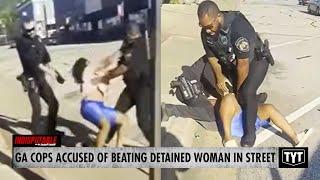 Cop With Violent History Accused Of Beating Detained Woman In Street