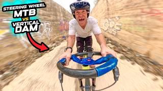 STEERING WHEEL FITTED MTB vs IMPOSSIBLE VERTICAL SPILLWAY!