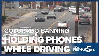 Colorado bans drivers from holding or using phones while driving starting Jan 1