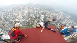  BASE JUMP GOES HORRIBLY WRONG! Andy Lewis Takes a Dramatic 1,200ft Plunge off KL Tower! 