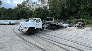 A day in the life of a 26 year old owner operator / Towing a lowered car