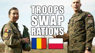 Polish  and Romanian  soldiers swap rations