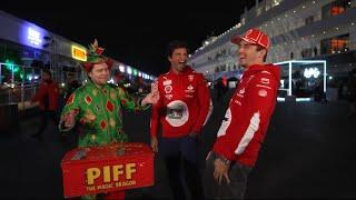 Piff the magic dragon shows Carlos and Charles some magic tricks at the Vegas GP