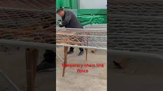 Temporary chain link fence in production