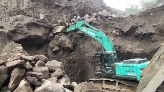 digging sand around large rocks is very risky