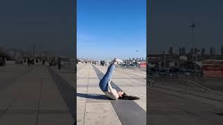 girl stand jump on public place