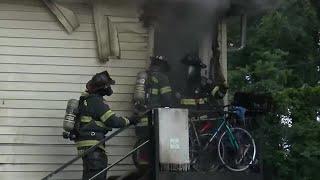 Small explosions lead firefighters to fight residential fire from the outside