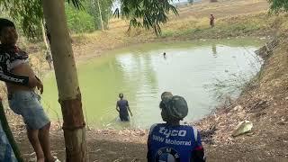 Enjoying a good time fishing at the rice field pond