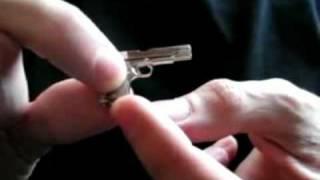 Smallest Automatic Hand Gun in the World .Watch it Fire.See to Believe Handgun by Roy Dawson video