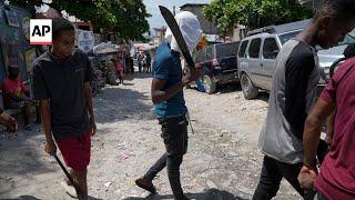 Vigilantes in Haiti strike back at gangsters with brutal street justice