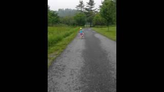 Lilly riding her bike