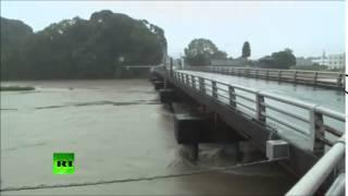 POWERFUL typhoon CAUSES  flooding in JAPAN