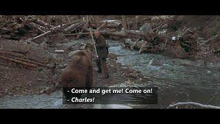 The Edge (1997) Charles stabs it and bear advances on him It rears onto its hind legs and collapses