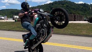 Learning new tricks… progression sessions of stunt riding a Harley-Davidson