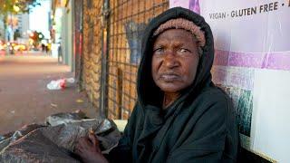 80-year-old Woman Sleeping on a Sidewalk Homeless in Sad Diego