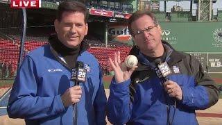 Gene Lavanchy pulls a baseball out of Tom Leyden's ear