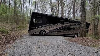 Driving a brand new 402ts diesel sportscoach pusher up a steep driveway.