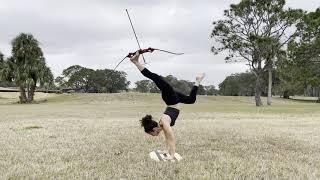 Can I catch arrows BLINDFOLDED while an acrobat shoots the bow in a HANDSTAND???