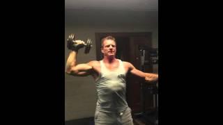 One arm dumbbell shoulder press by Peter Power