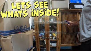 HIDDEN CABINET FOUND IN THE BACK OF THIS ABANDONED STORAGE LOCKER!