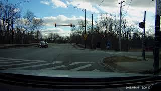 Minivan Driver Blows a Red Light while using a Phone